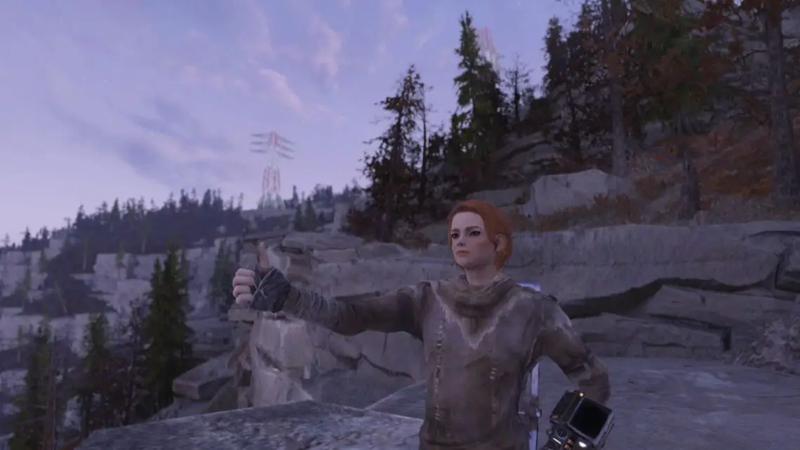 Fallout 76 veterans: Player standing on mountain giving a thumbs up