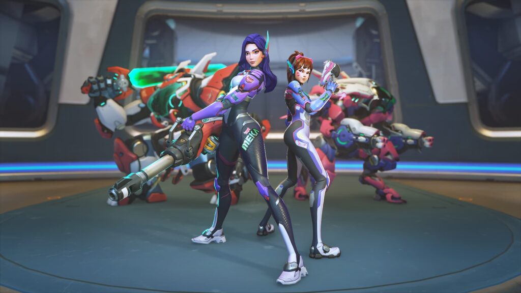 Overwatch D.Mon and D.Va stand side by side with their mechs in the background.
